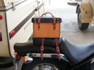 D-rings and buckles strap it onto the passenger seat